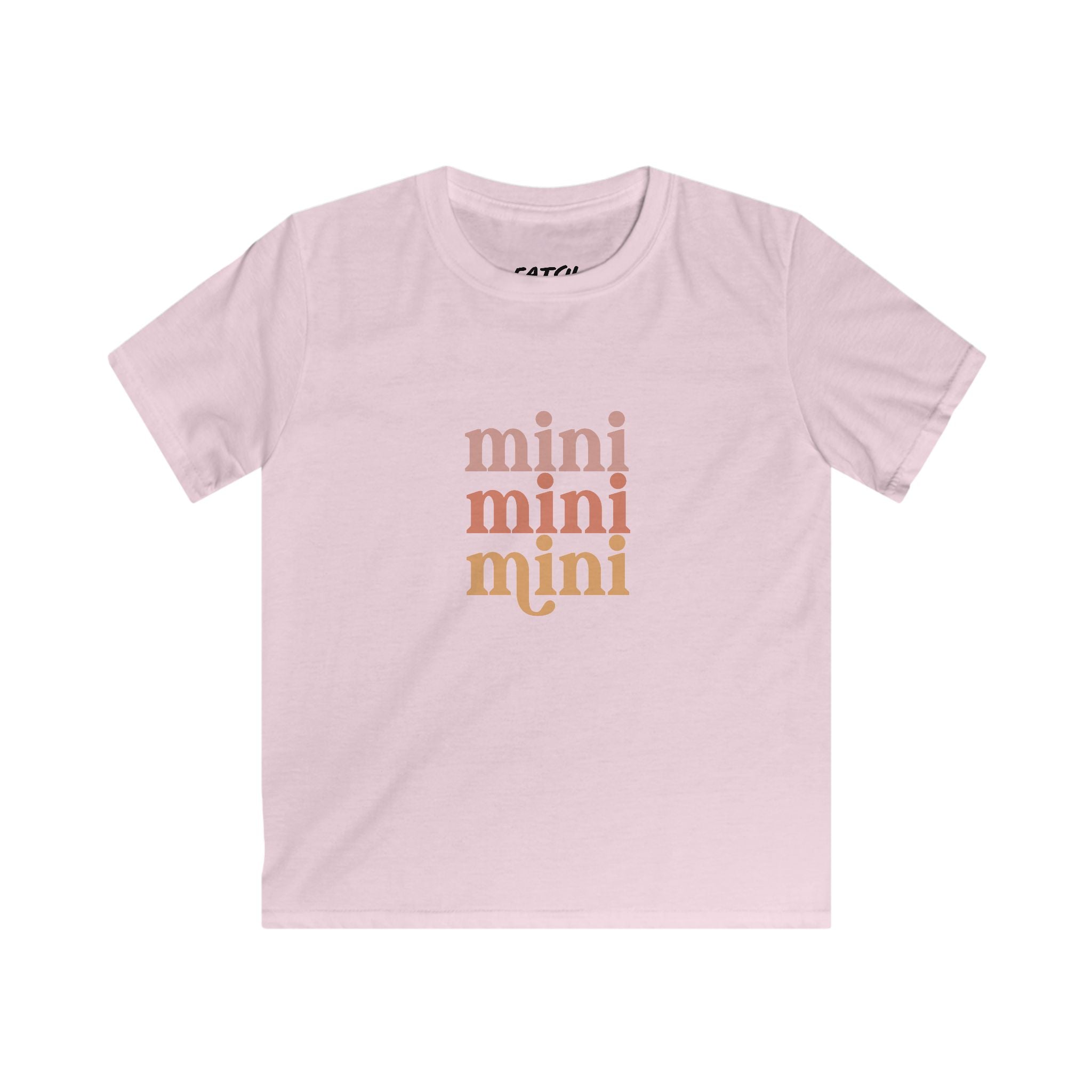 Pink t-shirt with 'mini' text in gold on a white background