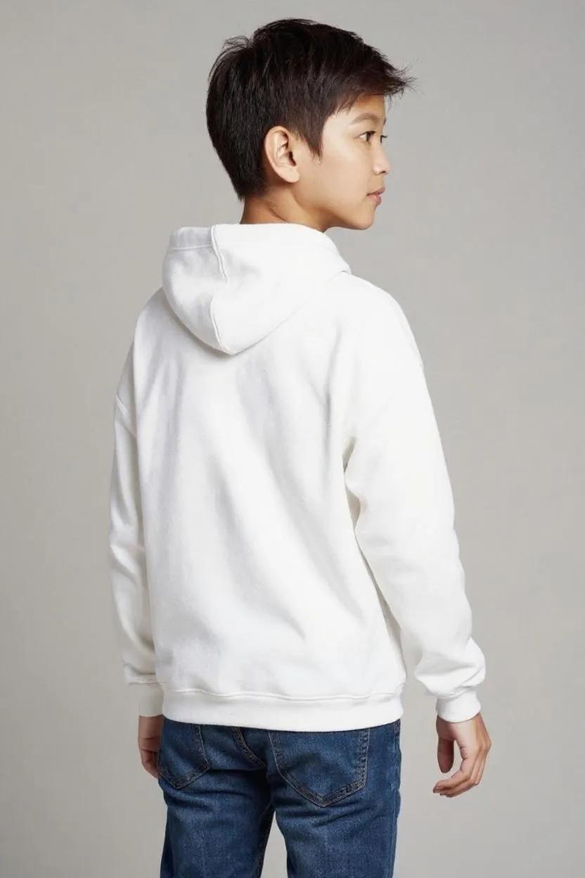 Person wearing a white hoodie and blue jeans on a gray background