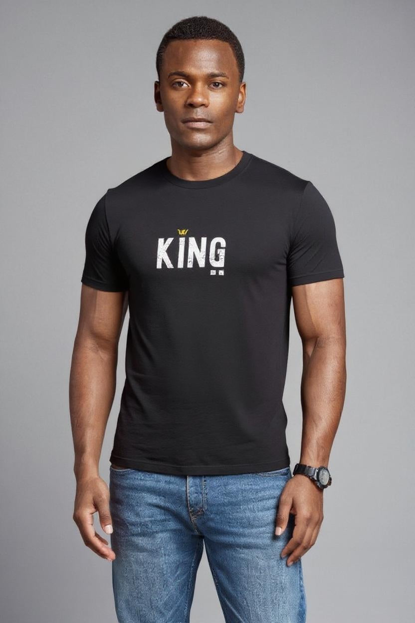 Man wearing a black t-shirt with 'KING' text on a gray background