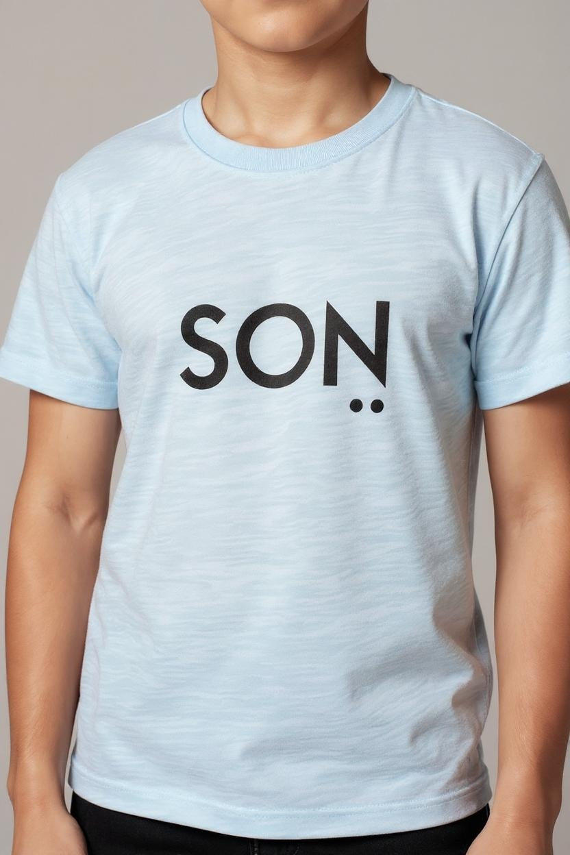 Light blue t-shirt with 'SON' printed on it worn by a person.