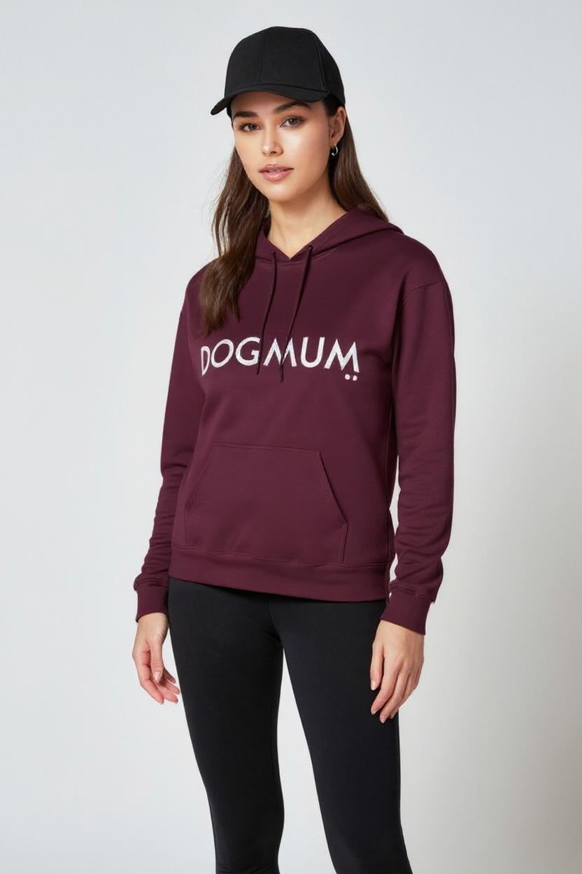 Woman wearing a maroon hoodie with 'DOGMAUM' text on a white background