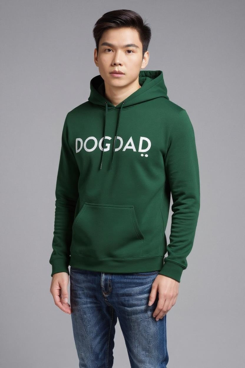Person wearing a green hoodie with 'DOGAD' text on a gray background