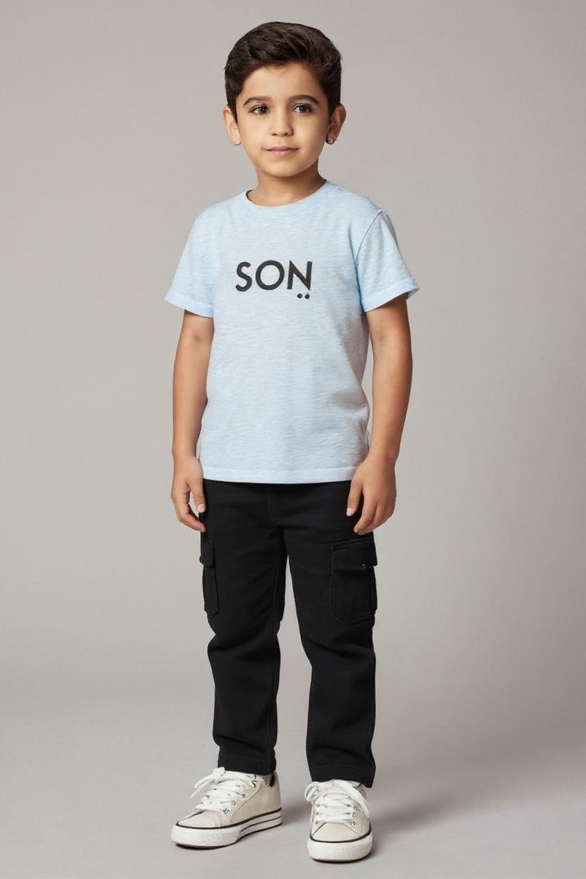 Child wearing a light blue t-shirt with 'SON' printed on it, standing against a plain background.