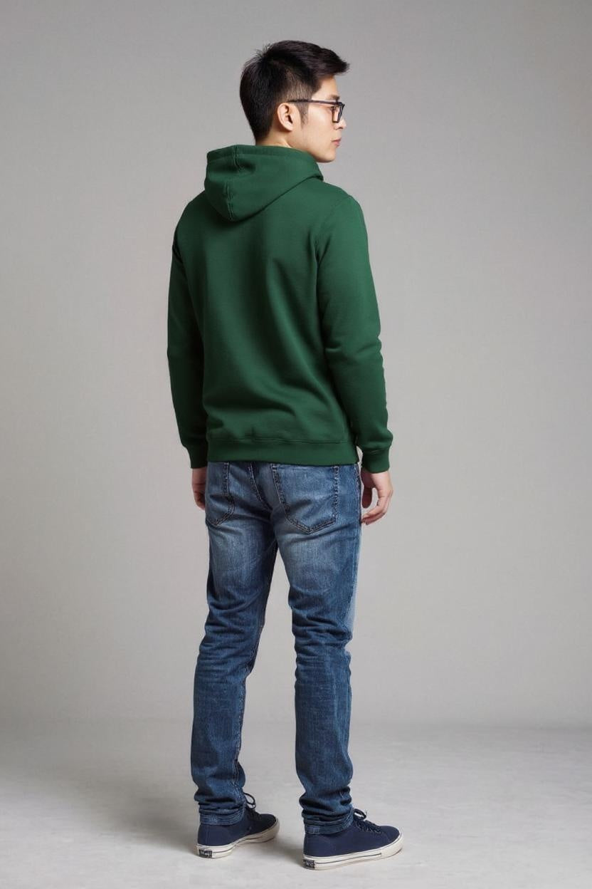 Person wearing a green hoodie with back turned